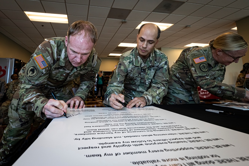 Senior leaders sign Suicide Prevention Month pledge