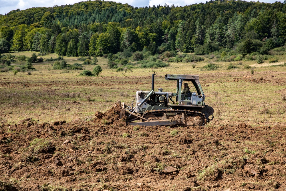 West Virginia Army National Guard engineers perform land excavation