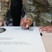 Fort Meade Garrison Command Team Signs Proclamation on World Suicide Prevention Day