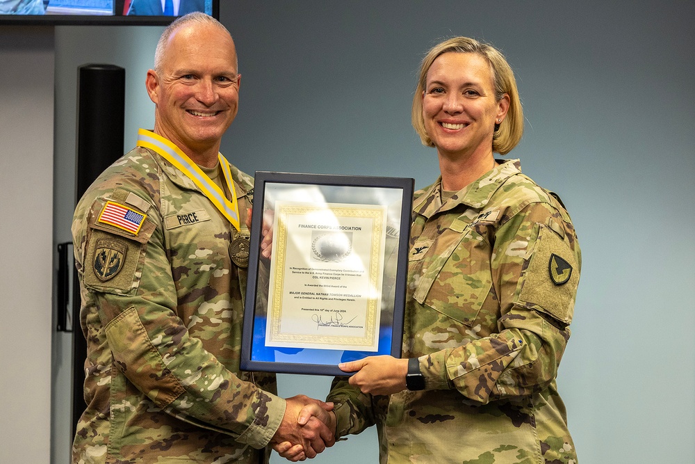 USAFMCOM finance leaders awarded Towson Medallions