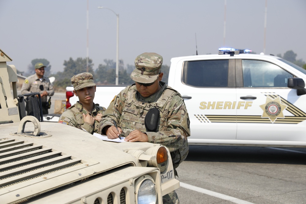 National Guardsmen from the California Army National Guard's 330th Military Police support efforts to contain Line Fire