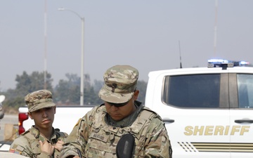 National Guardsmen from the California Army National Guard's 330th Military Police support efforts to contain Line Fire