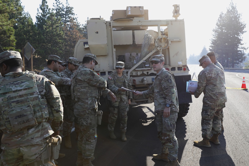 National Guardsmen from the California Army National Guard's 330th Military Police support efforts to contain Line Fire