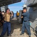 Sailors aboard the USS Howard conduct a security reaction force class in the Philippine Sea