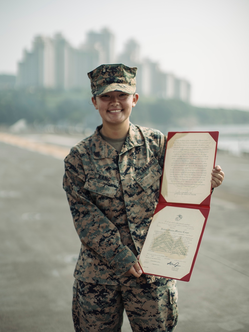 15th MEU Marine promoted on deployment by her Korean family