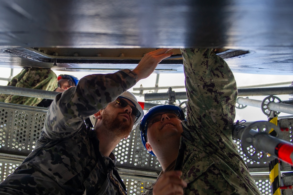 USS Emory S. Land Sailors Conduct Maintenance On USS Hawaii