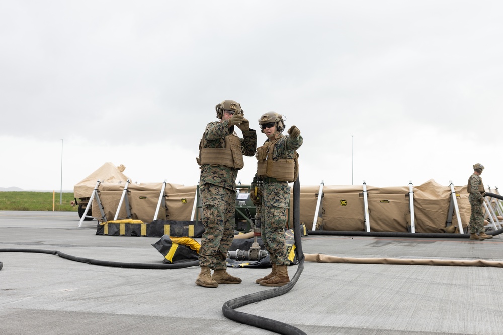 MWSS-271 Marines fuel a U.S. Air Force C-146A Wolfhound as part of exercise Northern Viking 24