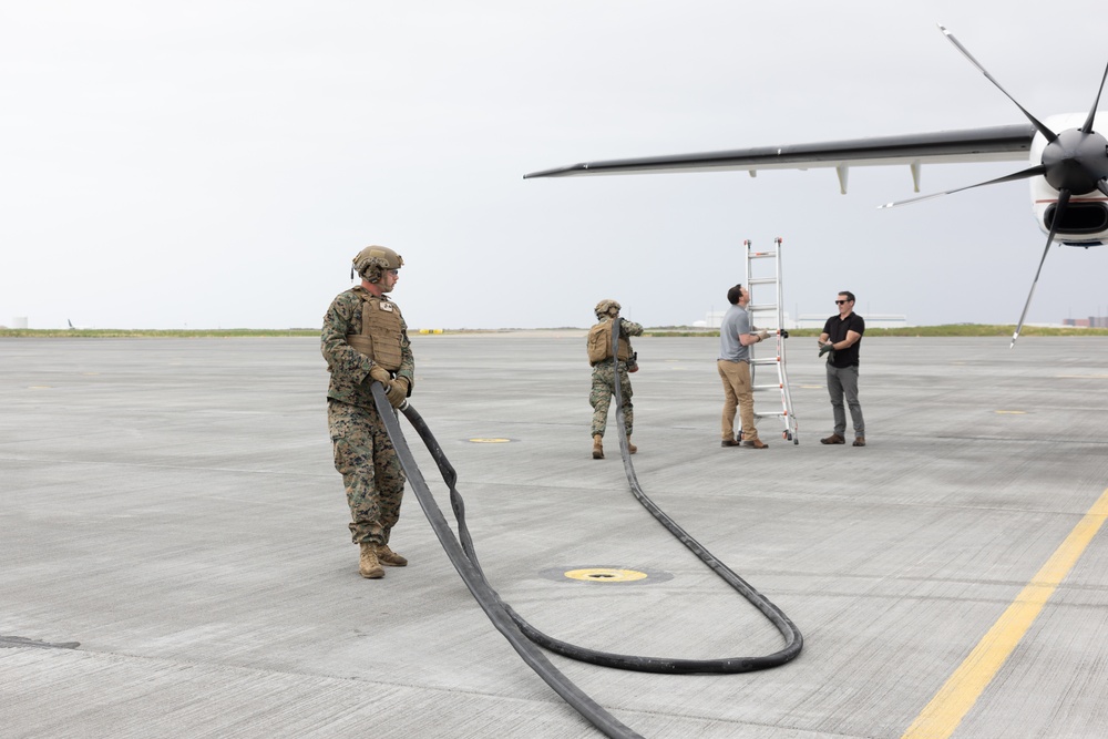 MWSS-271 Marines fuel a U.S. Air Force C-146A Wolfhound as part of exercise Northern Viking 24