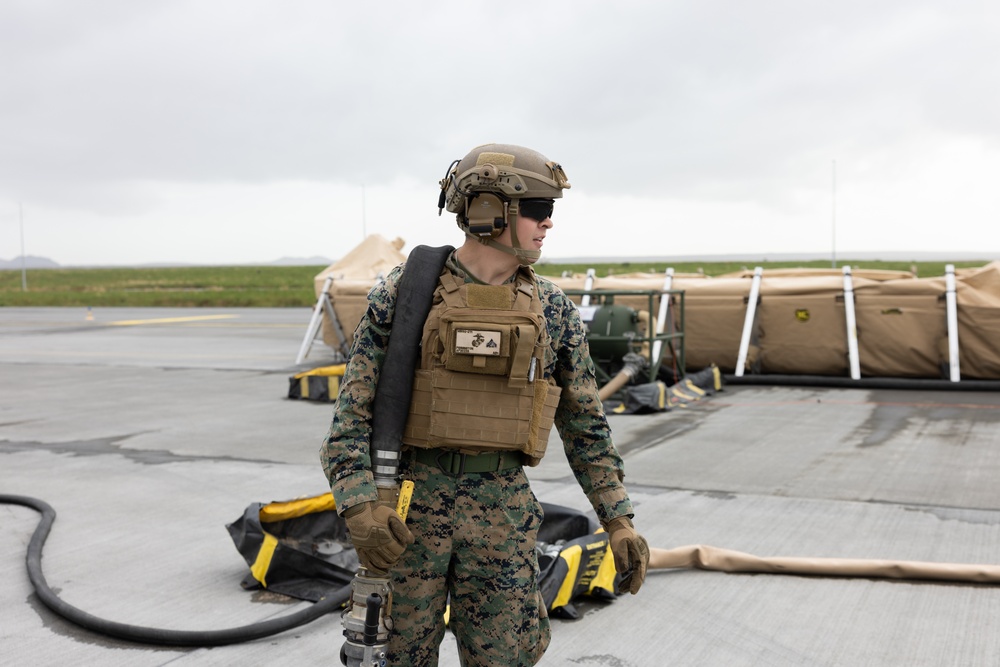 MWSS-271 Marines fuel a U.S. Air Force C-146A Wolfhound as part of exercise Northern Viking 24