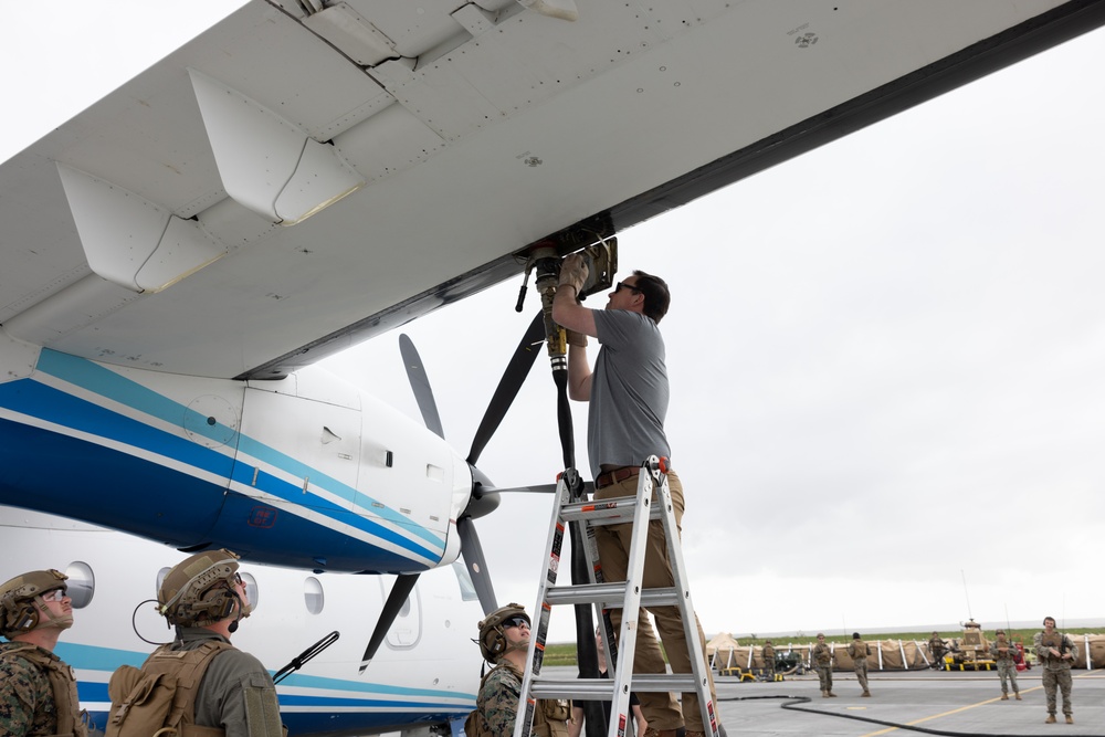 MWSS-271 Marines fuel a U.S. Air Force C-146A Wolfhound as part of exercise Northern Viking 24