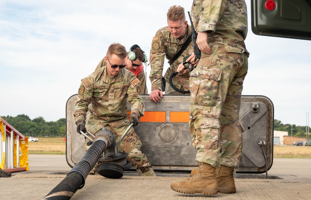 U.S. Airmen demonstrate new fueling procedures on F-15E Strike Eagles at RAF Lakenheath