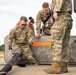 U.S. Airmen demonstrate new fueling procedures on F-15E Strike Eagles at RAF Lakenheath