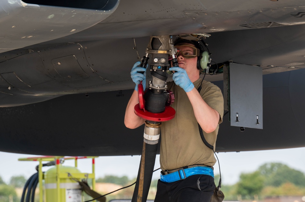 U.S. Airmen demonstrate new fueling procedures on F-15E Strike Eagles at RAF Lakenheath