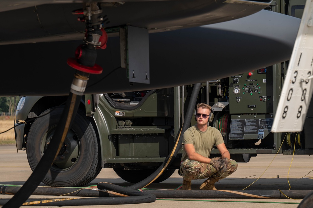 U.S. Airmen demonstrate new fueling procedures on F-15E Strike Eagles at RAF Lakenheath