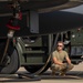 U.S. Airmen demonstrate new fueling procedures on F-15E Strike Eagles at RAF Lakenheath