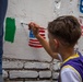 NAS Sigonella Sailors volunteer for a local school clean-up efforts.