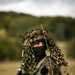 Bosnian soldier guards prisoners during training exercise