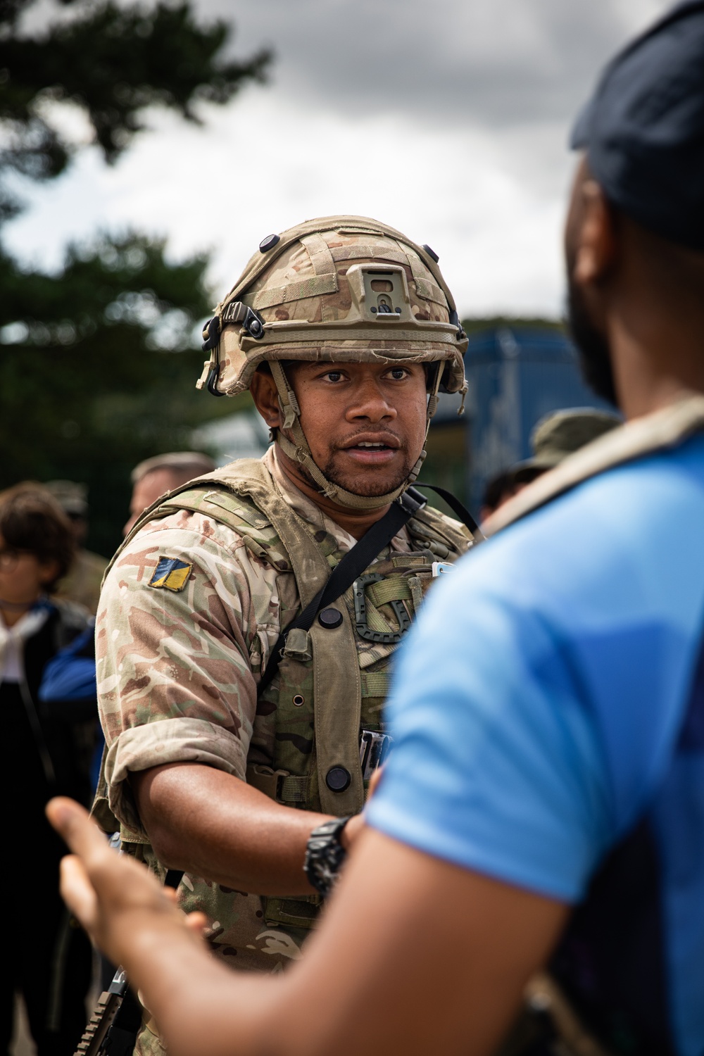 British soldier calms frustrated refugee