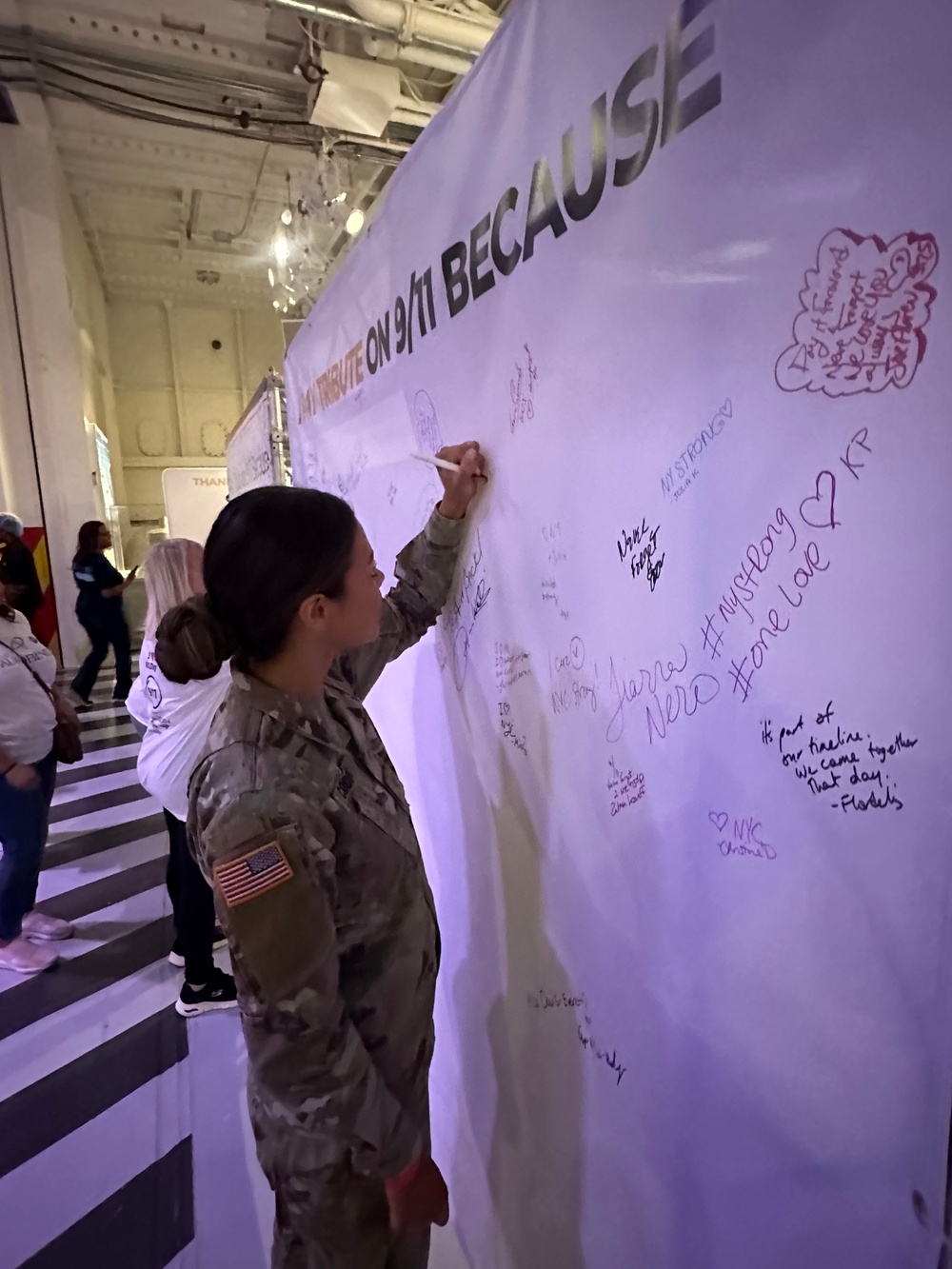 Miss USA, 2nd Lt. Alma Cooper leaves a message during 9/11 Day in NYC