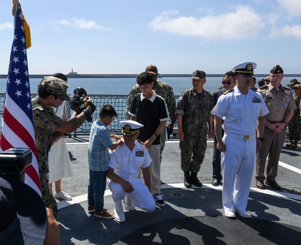 Three U.S. Naval Officers promote during ceremony aboard ROKS Gyeongnam