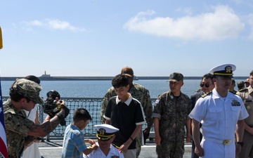 Three U.S. Naval Officers promote during ceremony aboard ROKS Gyeongnam