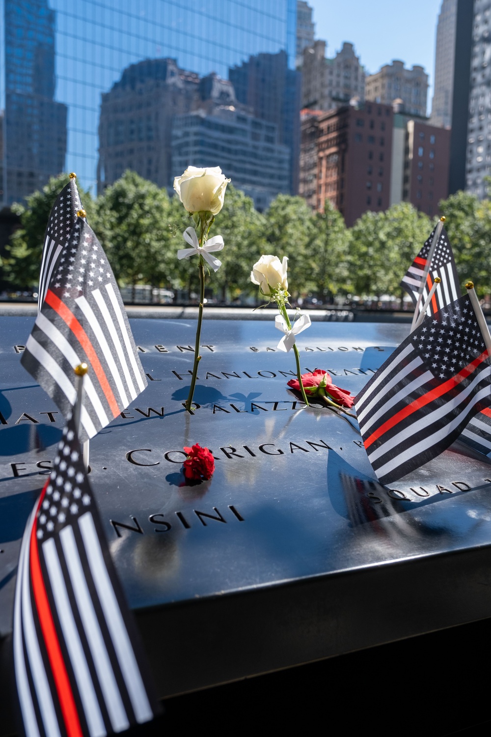 Coast Guard Members Lay Flowers During 9/11 Observance at Ground Zero