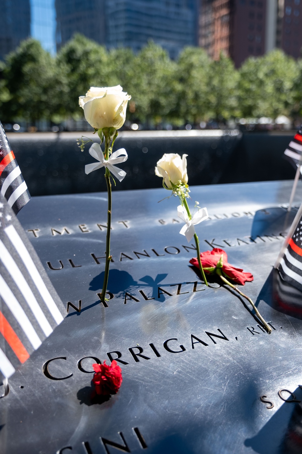 Coast Guard Members Lay Flowers During 9/11 Observance at Ground Zero