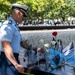 Coast Guard Members Lay Flowers During 9/11 Observance at Ground Zero