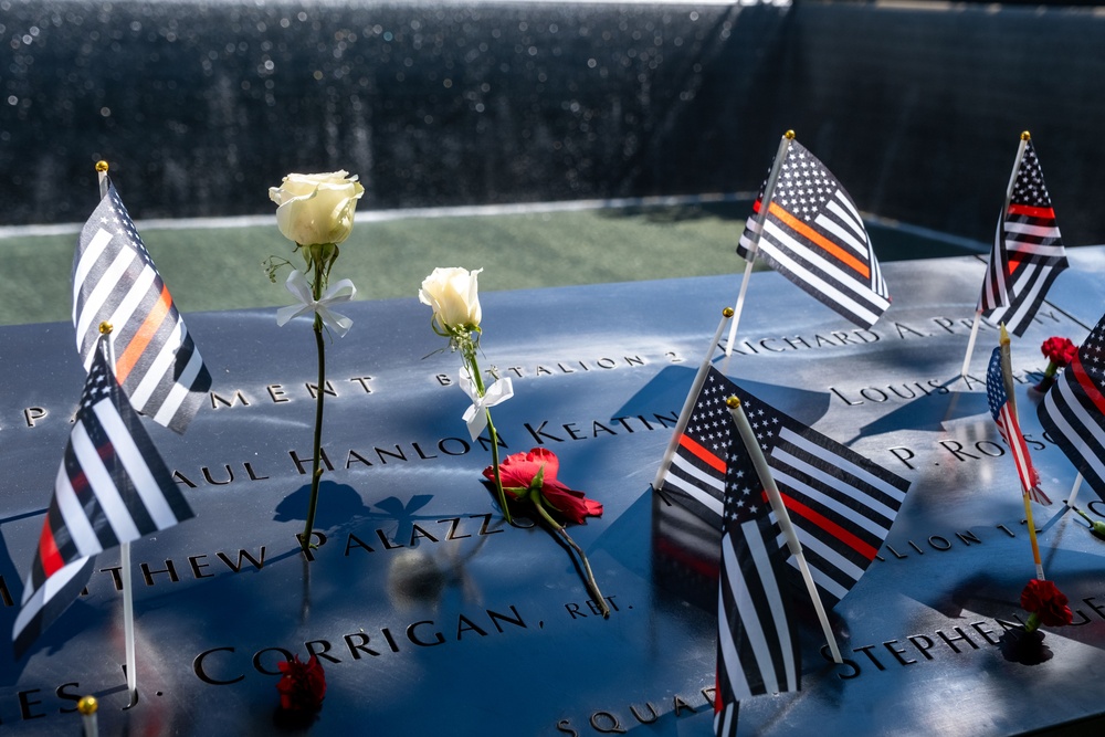 Coast Guard Members Lay Flowers During 9/11 Observance at Ground Zero