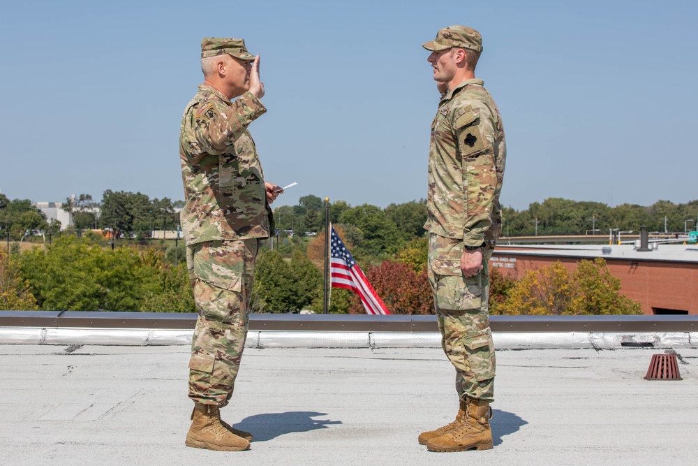 Staff Sgt. Frank Welle Re-enlists with 88th CG MG Ricciardi