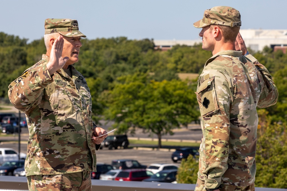 Staff Sgt. Frank Welle Re-enlists with 88th CG MG Ricciardi