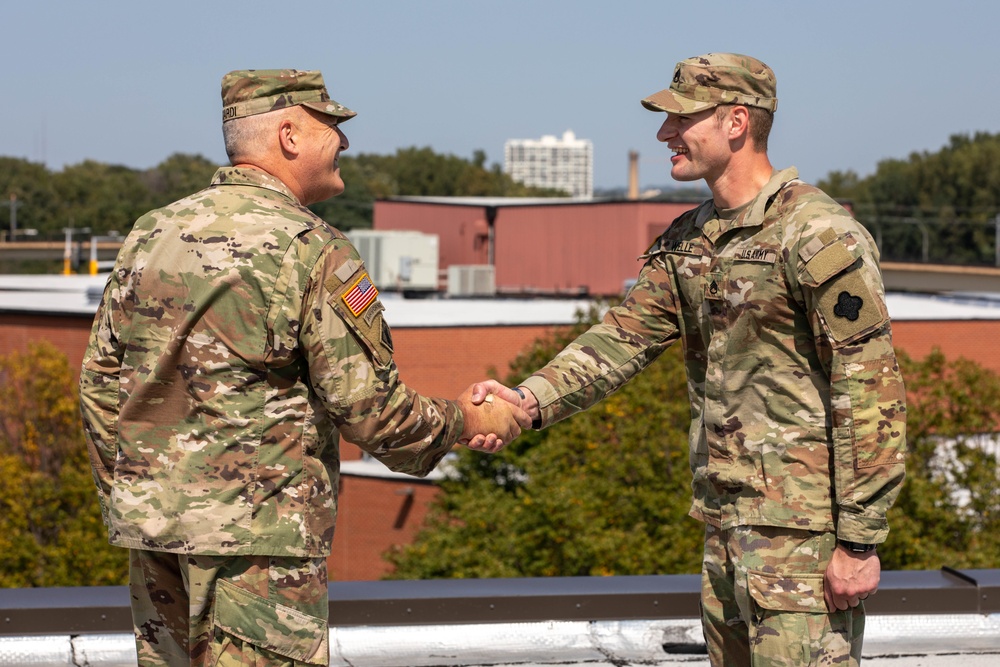 Staff Sgt. Frank Welle Re-enlists with 88th CG MG Ricciardi