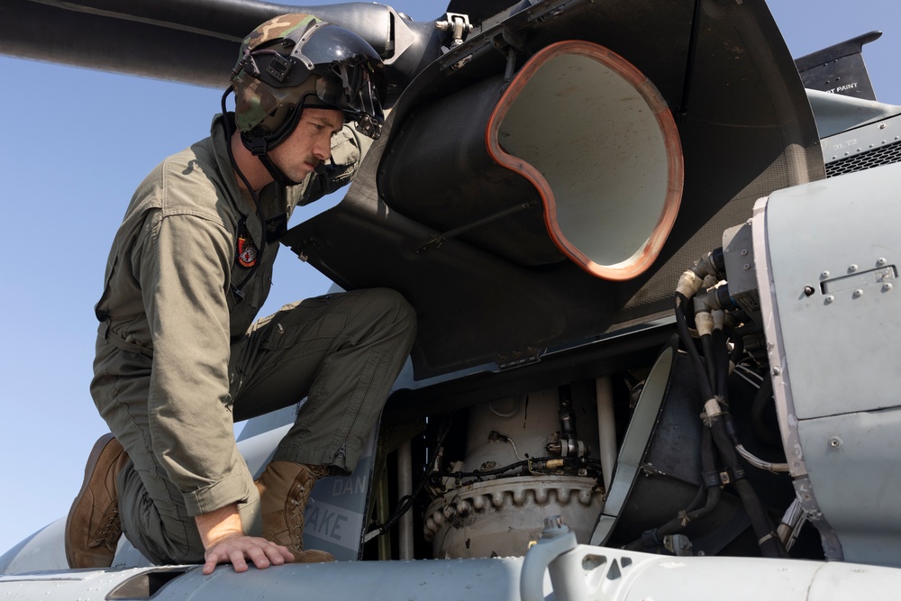 U.S. Marines with HMLA-167 conduct flight operations during Exercise Burmese Chase 24