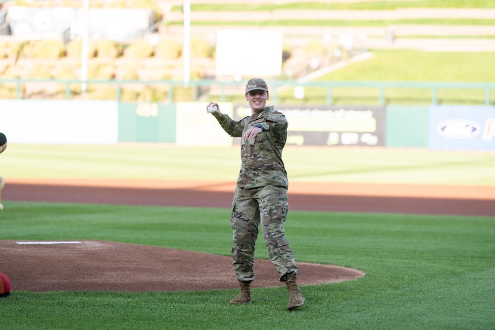 Airman of the Year, SrA Rachel Heath, throws the first pitch at Isotopes on Sept 11