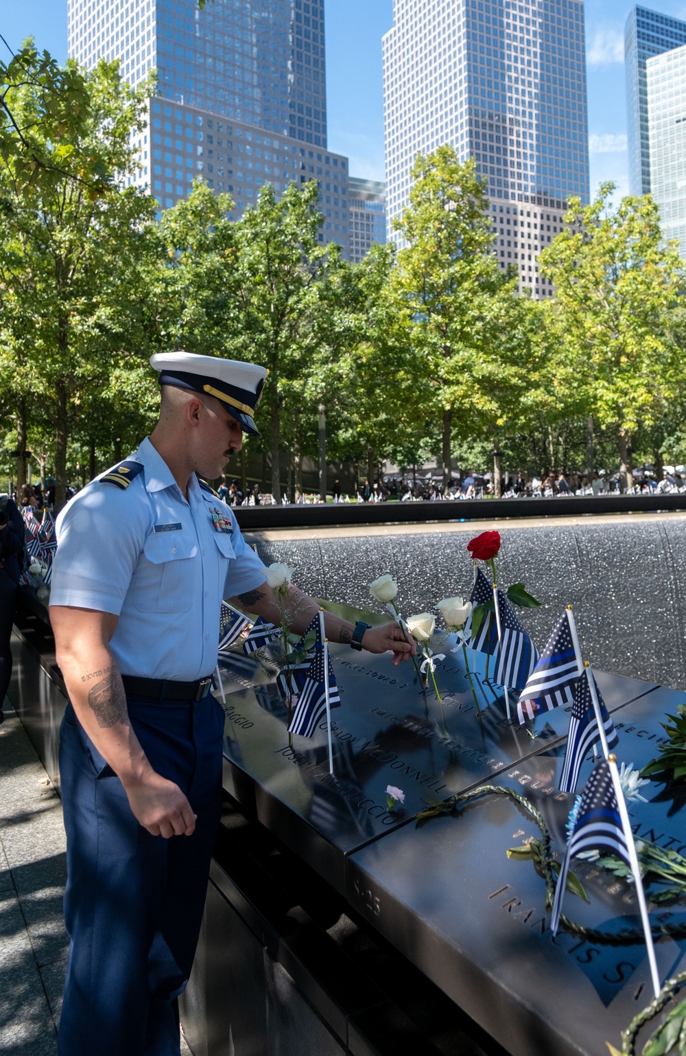 Coast Guard Members Lay Flowers During 9/11 Observance at Ground Zero