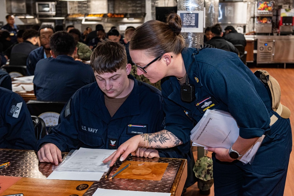 USS Ronald Reagan (CVN 76) Sailors take Navy-wide advancement exam