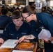 USS Ronald Reagan (CVN 76) Sailors take Navy-wide advancement exam