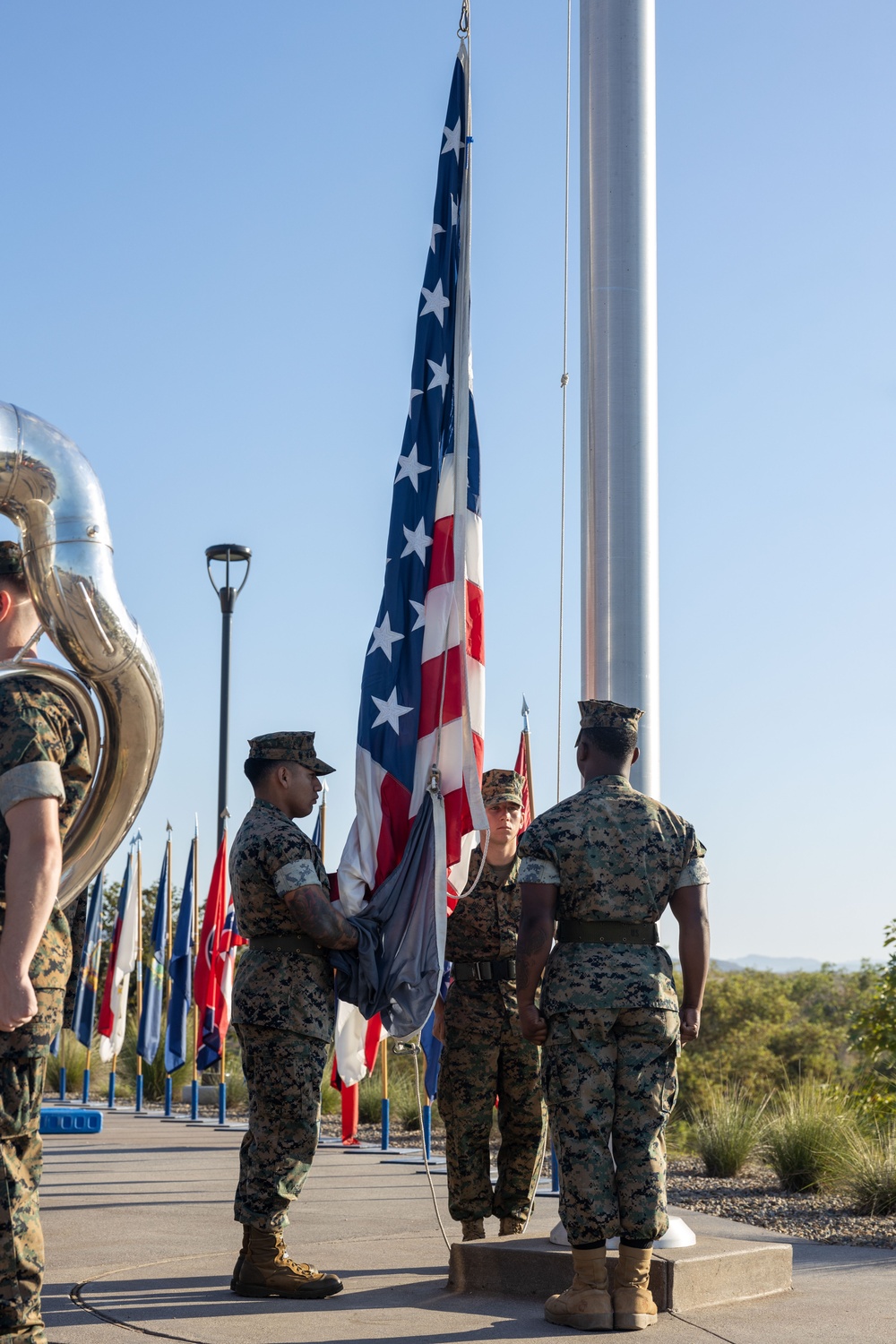 1st Marine Division leaders recognize Marines, Sailors during morning colors ceremony