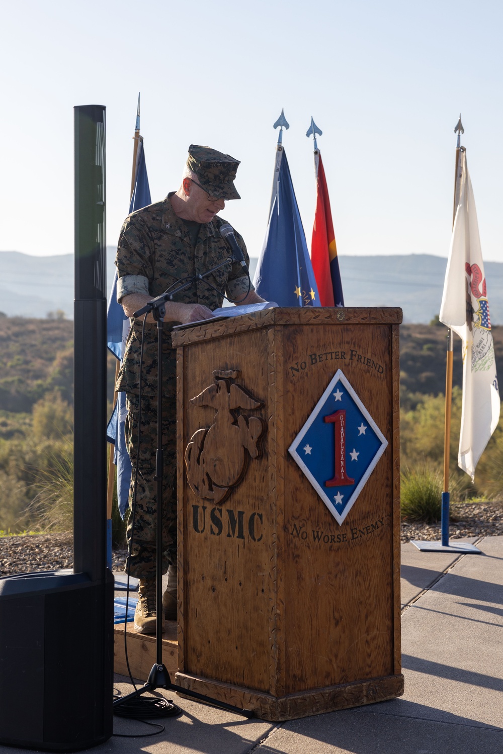 1st Marine Division leaders recognize Marines, Sailors during morning colors ceremony