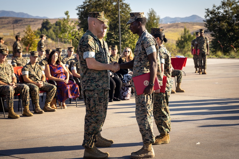 1st Marine Division leaders recognize Marines, Sailors during morning colors ceremony