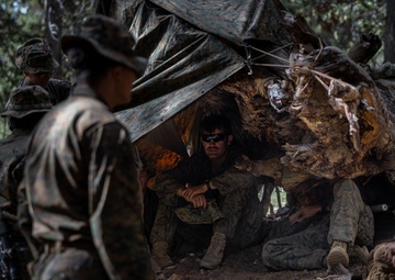 Marines with 2/1 practice survival techniques during Mountain Exercise 5-24