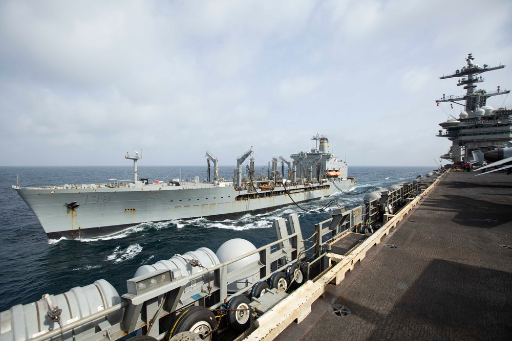 Abraham Lincoln conducts a replenishment-at-sea with USNS Big Horn