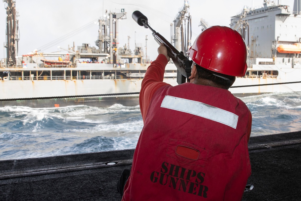 Abraham Lincoln conducts a replenishment-at-sea with USNS Big Horn