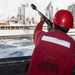 Abraham Lincoln conducts a replenishment-at-sea with USNS Big Horn