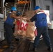 Abraham Lincoln conducts a replenishment-at-sea with USNS Big Horn