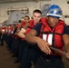 Abraham Lincoln conducts a replenishment-at-sea with USNS Big Horn