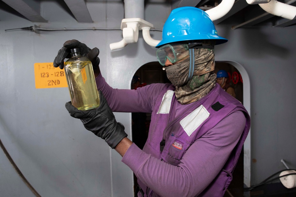 Abraham Lincoln conducts a replenishment-at-sea with USNS Big Horn