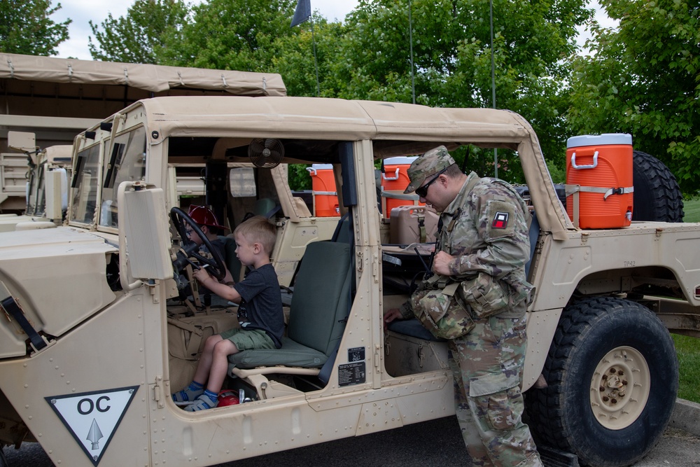 OC/T Shows HMMWV to Young Visitor