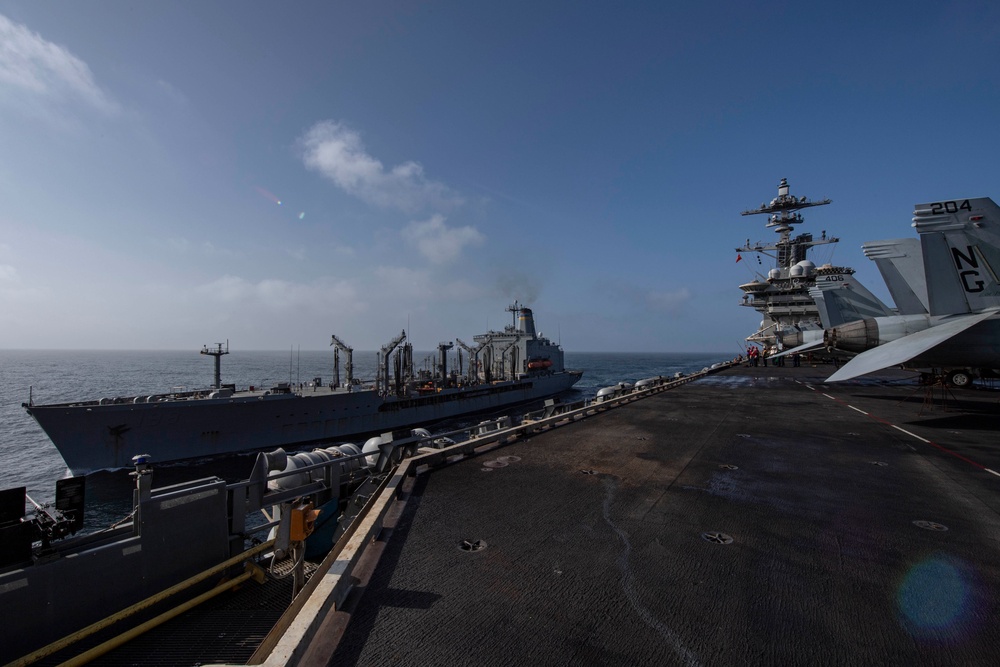 Abraham Lincoln conducts a fueling-at-sea with USNS Big Horn