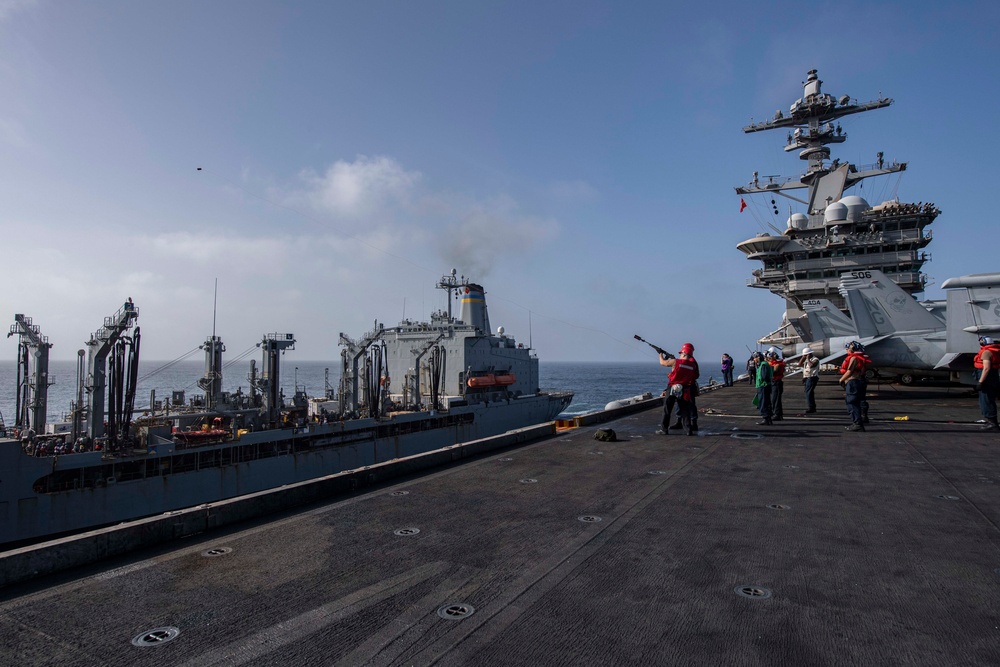 Abraham Lincoln conducts a fueling-at-sea with USNS Big Horn